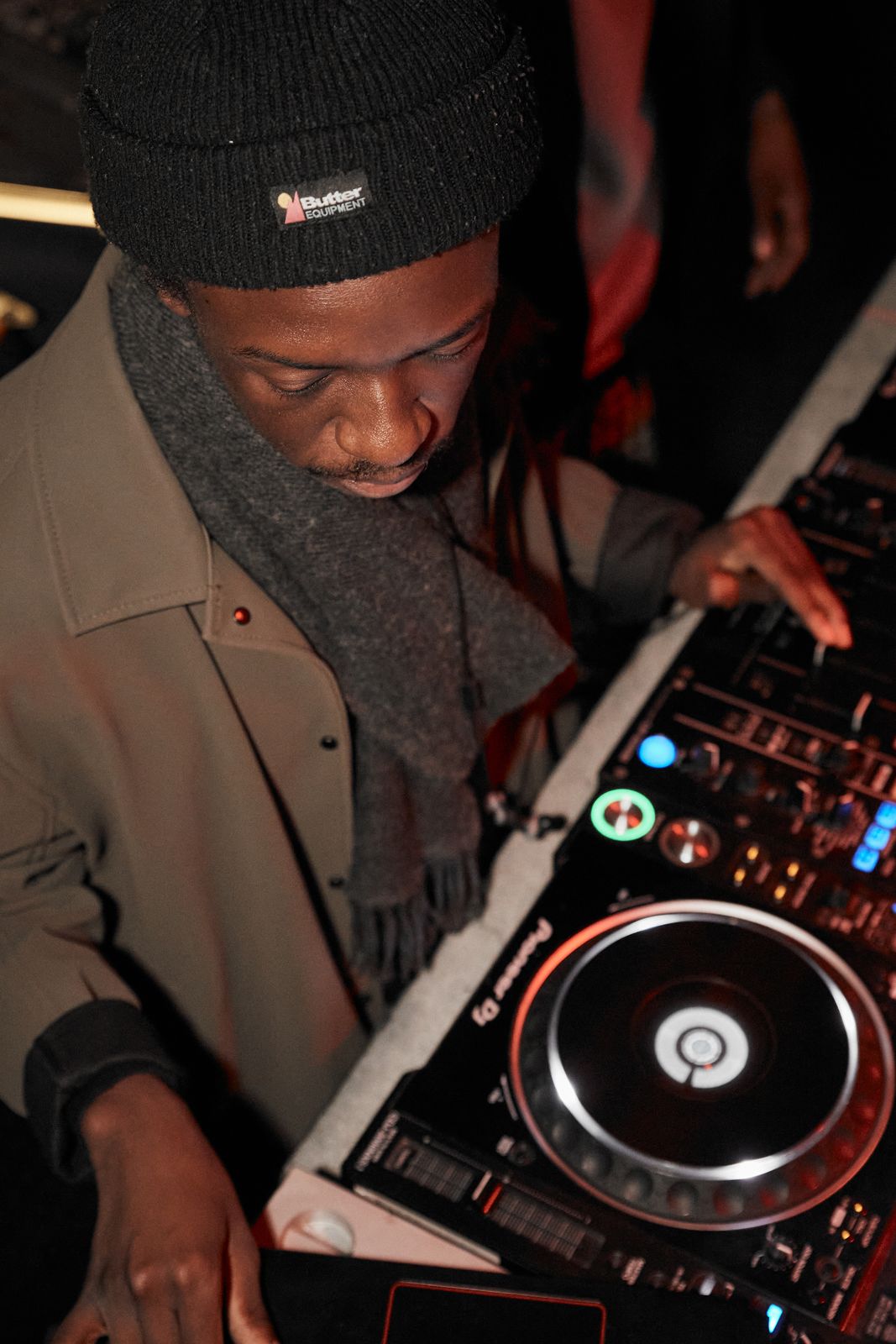 A DJ working the decks at an Ice Cream Sundays night
